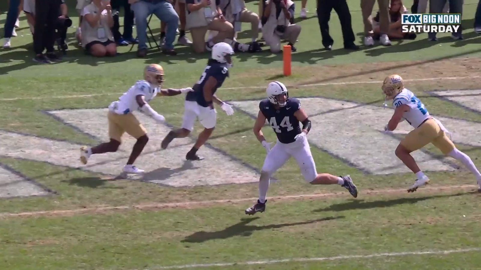 Penn State's Drew Allar connects with Tyler Warren for a the touchdown